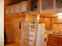 Inside the popular Madrona family cabin kit made by bavariancottages.com 